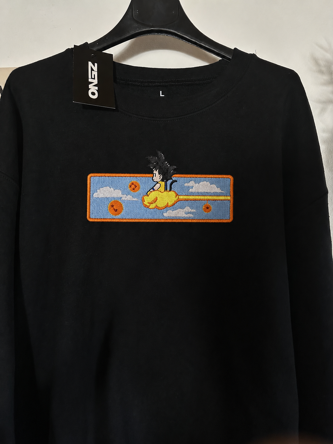 Felpa premium con ricamo "Goku bambino"