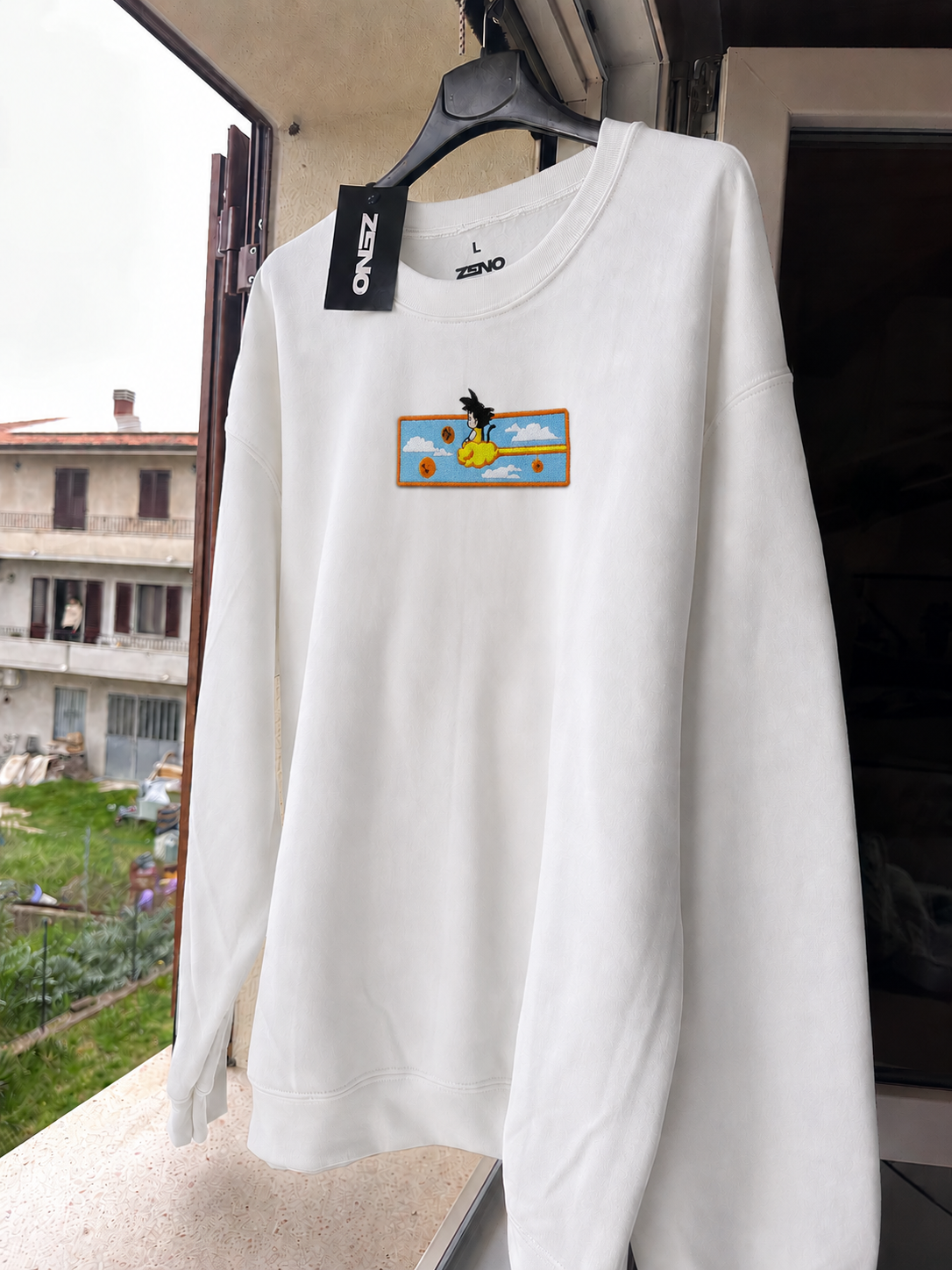 Felpa premium con ricamo "Goku bambino"