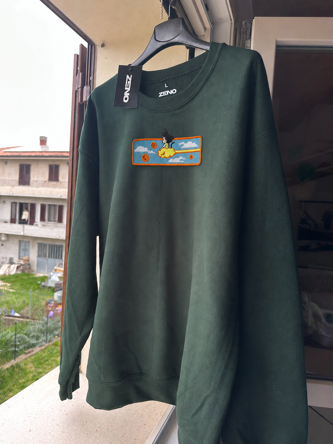 Felpa premium con ricamo "Goku bambino"