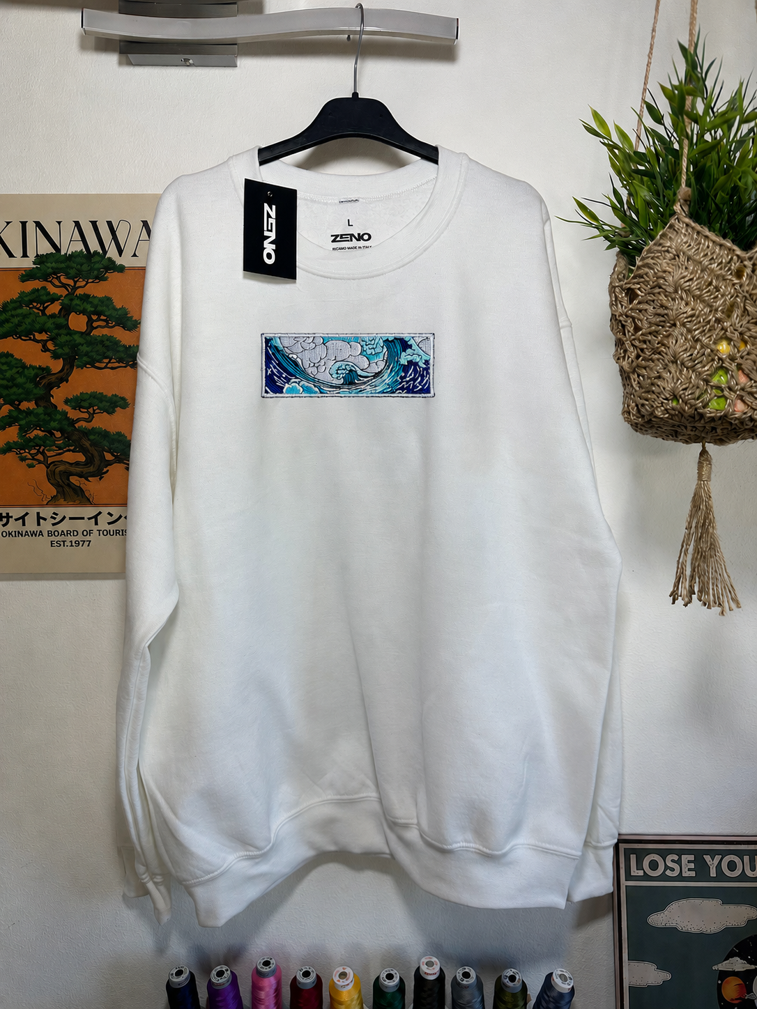Felpa premium con ricamo "La grande onda"