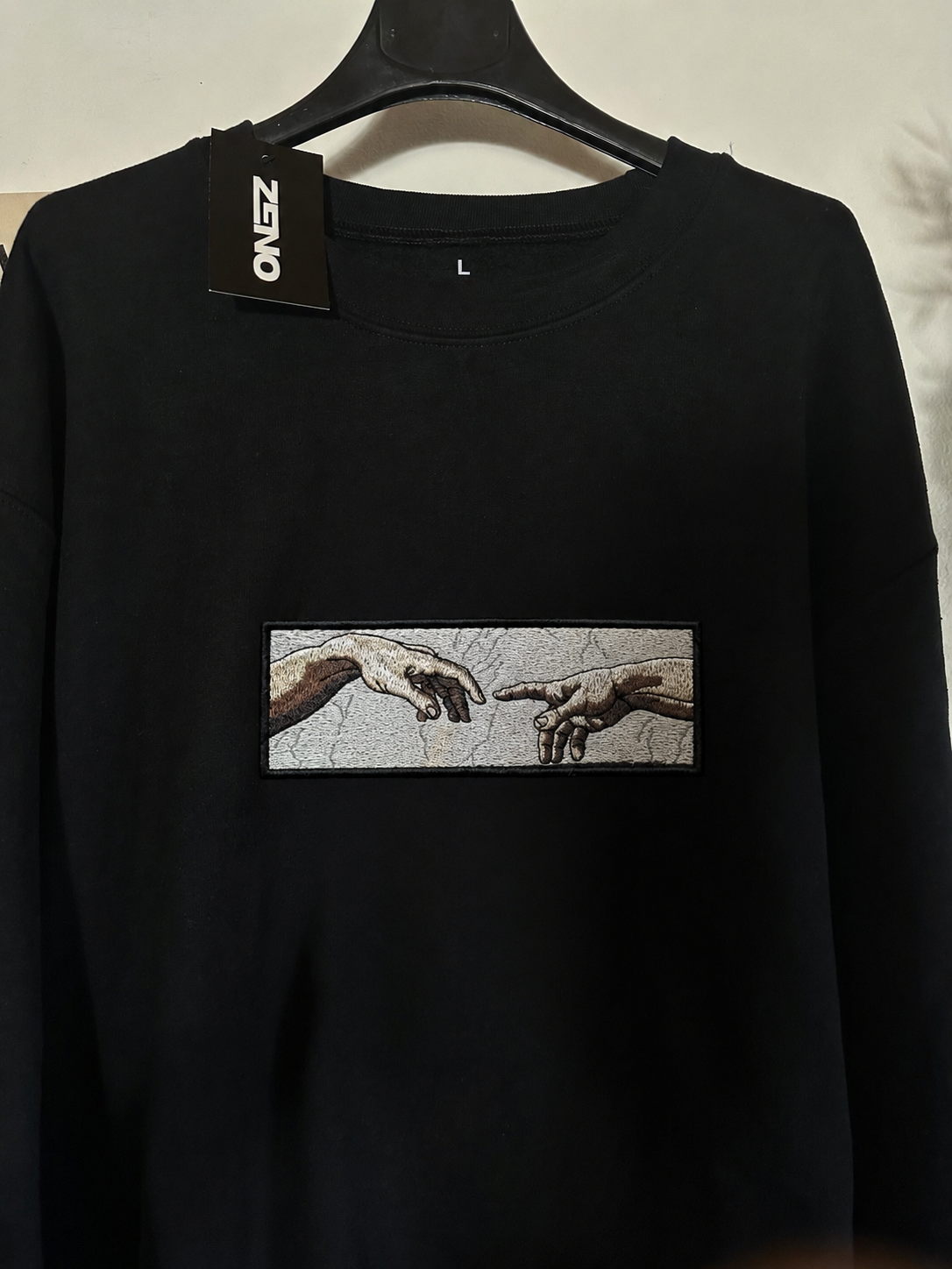 Felpa premium con ricamo "mani di adamo"