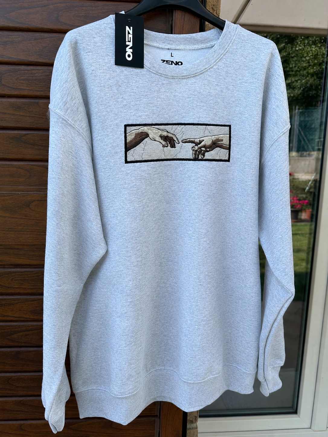 Felpa premium con ricamo "mani di adamo"