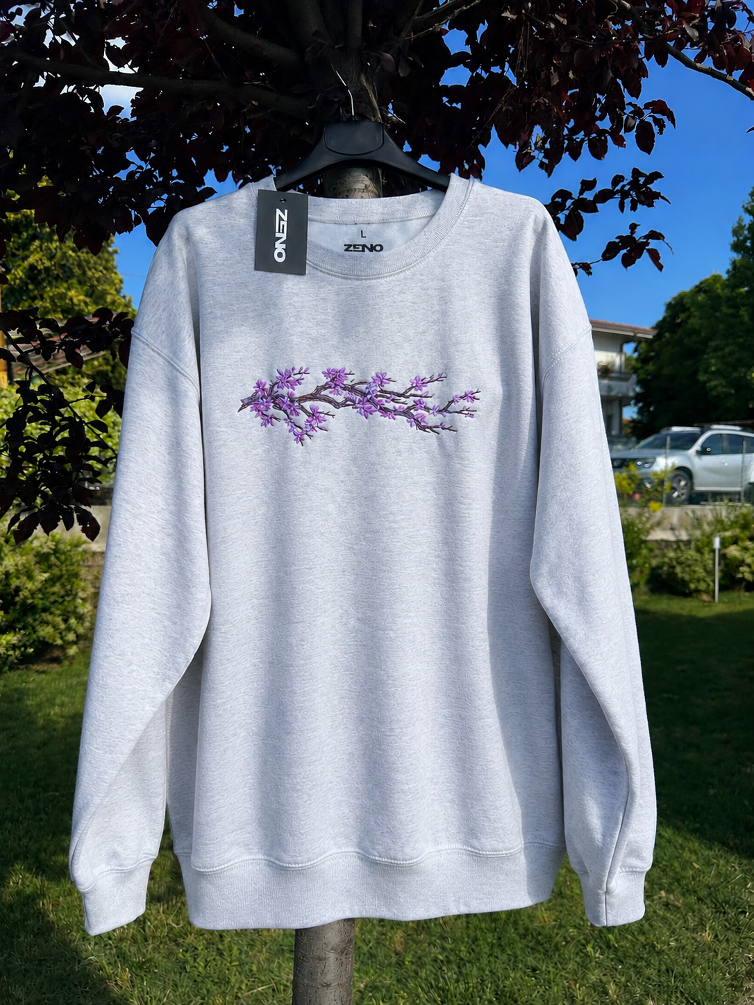 Felpa premium con ricamo "Ramo ciliegio"